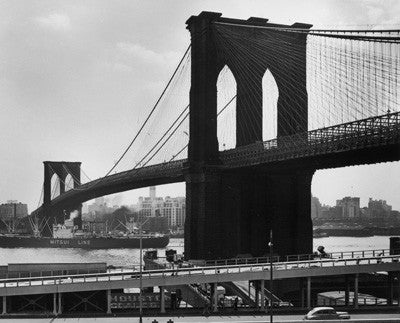 Mitsui Line ship passing under Brooklyn Bridge on the East River by Andreas Feininger