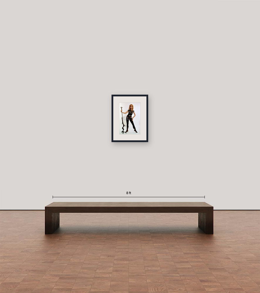Room view — Actress Jane Fonda in publicity still for Barbarella by Carlo Bavagnoli shown to scale on a gallery wall at 20 x 16 in. Not a reproduction of the work.