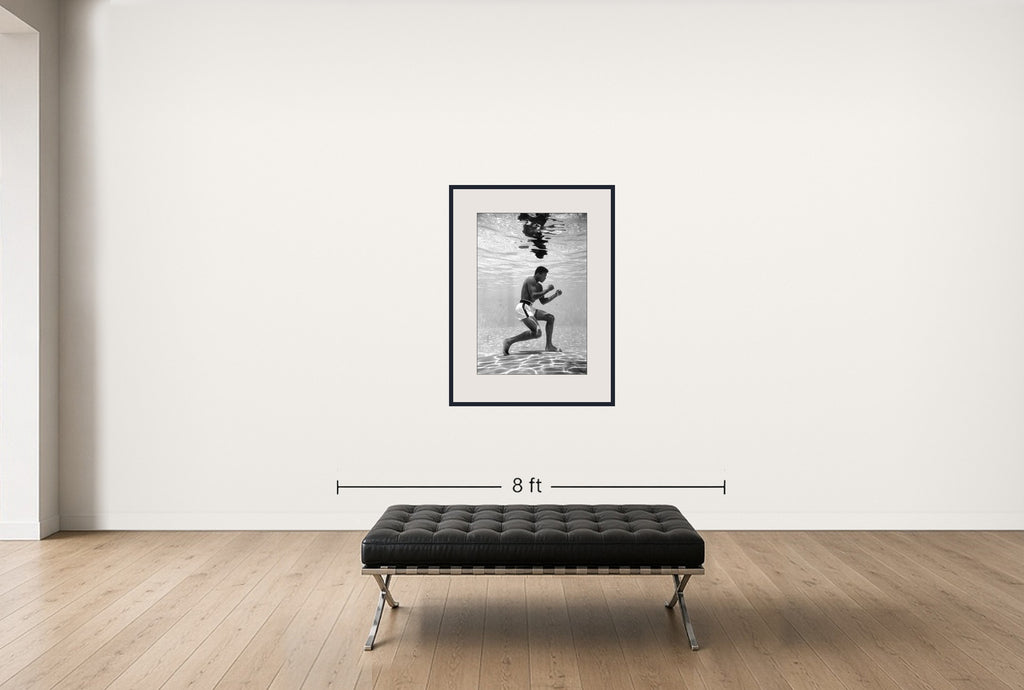 Room view — Ali Underwater by Life shown to scale on a gallery wall at 40 x 30 in. Not a reproduction of the work.