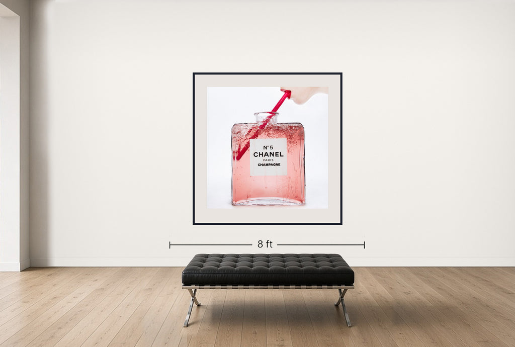 Room view — Champagne Chanel No. 5 by Tyler Shields shown to scale on a gallery wall at 60 x 60 in. Not a reproduction of the work.