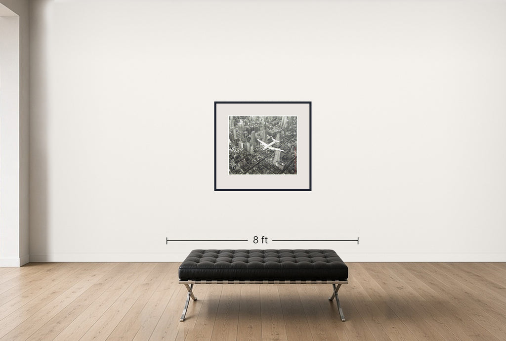 Room view — DC-4 Flying Over NYC by Margaret Bourke-White shown to scale on a gallery wall at 30 x 40 in. Not a reproduction of the work.