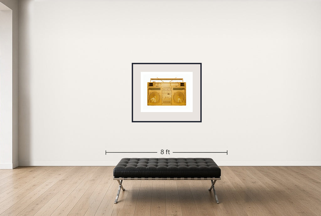 Room view — Gold Boombox 002 2018 by Lyle Owerko shown to scale on a gallery wall at 32 x 44 in. Not a reproduction of the work.