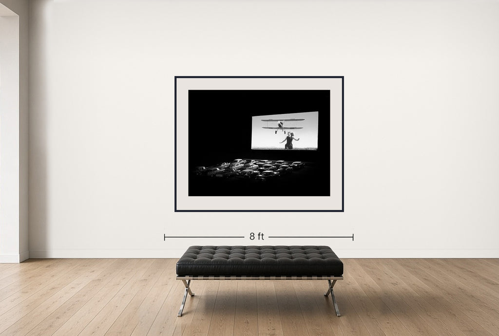 Room view — Drive In by Tyler Shields shown to scale on a gallery wall at 54 x 72 in. Not a reproduction of the work.