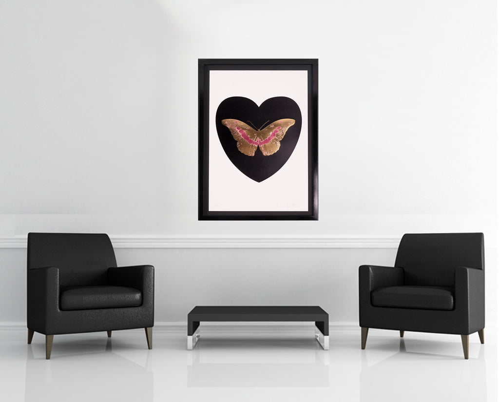 Room view — I Love You Butterfly, Black/Coral, 2015 by Damien Hirst shown to scale on a gallery wall at 44.5 x 32.75 in. Not a reproduction of the work.