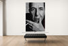 Room view — Leonard Cohen vs. Bob Dylan by Alex G Cao shown to scale on a gallery wall at 108 x 72 in. Not a reproduction of the work.