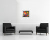 Room view — Showing Off the Wings by Clemens Briels shown to scale on a gallery wall at 19 x 19 in. Not a reproduction of the work.