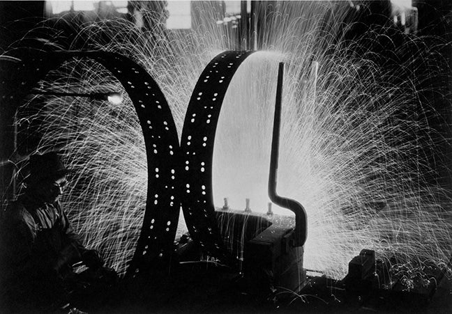 Welding tire rims, International Harvester - Margaret Bourke-White