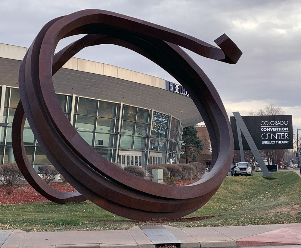 Denver's Bernar Venet sits outside the Denver Convention Center