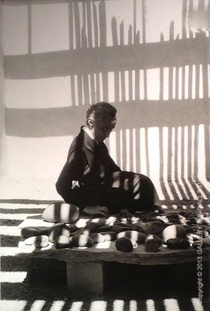 Georgia O'Keeffe Siting with Her Rock Collection by John Loengard
