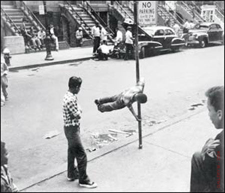 Boy Chinning on Pole by Walter Rosenblum