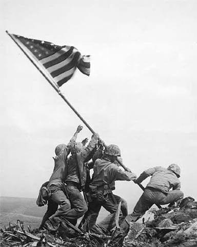 Flag Raising at Iwo Jima by Joe Rosenthal.